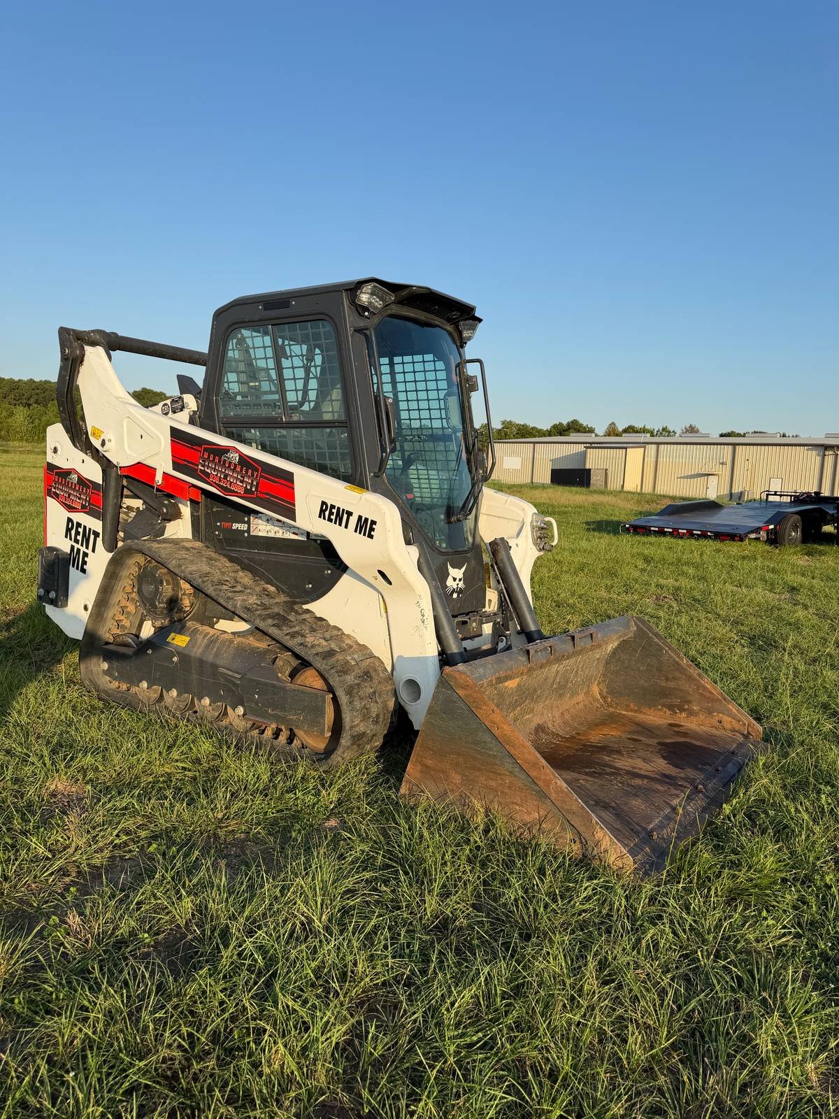 Bobcat T66 compact track loader for rent, front left view, Montgomery TX
